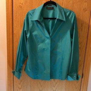 Turquoise cuffed blouse.